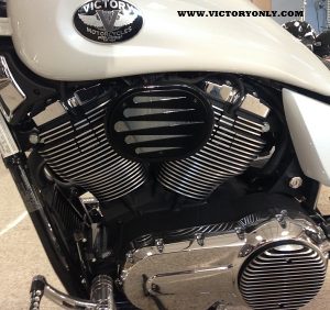 SPARK PLUG FILLERS FINNED VICTORY MOTORCYCLE PICTURE INSTALLED FILLS GAP IN MOTOR WHERE SPARK PLUG INSERTS