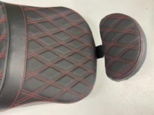 Features solar-reflective leather in the seating area and automotive-grade vinyl on the sides; patented process reduces surface temperature by as much as 25°F for a cooler seat, higher durability and longer life over conventional leather or vinyl 3/16" ABS thermoformed seat base for a perfect fit, and fully carpeted bottom with rubber bumpers to protect paint Lower position creates better rider position with improved styling Passenger backrest included; no driver backrest option Flexible urethane foam interior for maximum comfort Specifically for Victory Hammer Includes all mounting hardware Made in the U.S.A.