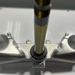 LOWER TRIPLE TREE STEERING STEM ASSEMBLY W/ BEARING
