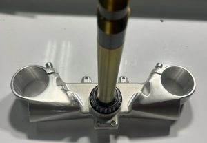 LOWER TRIPLE TREE STEERING STEM ASSEMBLY W/ BEARING
