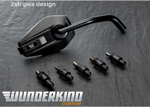 Wunderkind Universal Motorcycle handlebar mirror available individually as left or right-hand side or of course as a pair. The head of the housing is made of CNC 3D milled aluminium and mirror glass itself is tinted and convex (reduces dazzlings). The arm of the mirror is always black. The mirror housing is available in black, silver and in the design 2Stripes with contrast cut lines on the rear 5 adaptors included All Wunderkind products are made to order and can take 10-14 days UK delivery. Integrated in the housing: Exchangeable impact protector made of black plastic. This item prevents the mirror housing against ugly scratches caused by bumping on the house or garage wall when parking the bike, for instance. The 'arm' of the mirror is elbowed twice. Thus, you have more movement freedom and super three-dimensional optics. 