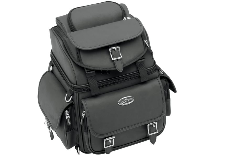 Rugged blend of leather-grained materials looks great on any type of motorcycle Rigid internal structure is strong enough to lean on, even when empty No sissy bar required Two mounting systems included: Saddlemen's Versa Mount™ seat harness or adjustable sissy bar strap system easily attach bag to motorcycle seat, luggage rack, or sissy bar Included backrest pad can be adjusted for additional comfort for the passenger or driver Sturdy grip handle for convenient carrying Includes detachable backpack straps for easy off-the-bike jaunts Spacious top-loading main compartment and large top-loading main compartment Padded storage compartment fits small laptop Four external pockets and five internal mesh pockets Easy-to-use side release buckles on each strap, decorative chrome buckles provide style Rain cover with security tether protects the bag from elements Top exterior flap can be adjusted to carry a jacket Mini-padlock for security (includes extra keys) Measures 15" H x 11" W x 10" D with 1,800 cubic inches of cargo capacity and holds one 3/4 helmet plus other cargo